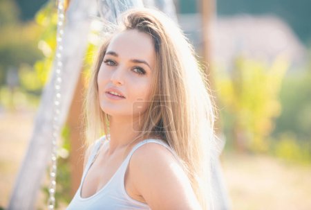 Photo for Portrait of beautiful young woman. Young woman on sunny spring day. Soft sunny colors Outdoor portrait of a cute girl. Happy cheerful female model, close up face - Royalty Free Image