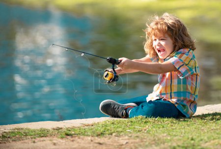 Photo for Portrait of excited amazed child boy fishing - Royalty Free Image