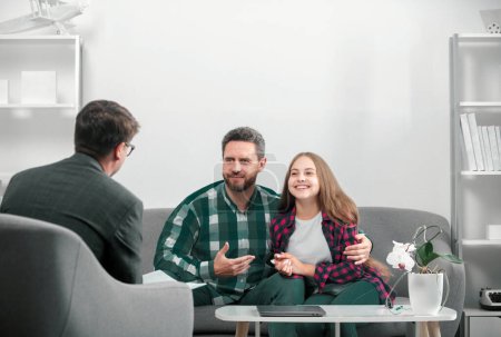 Photo for Psychology, mental family therapy, psychologist with father and daughter at psychotherapy session on psychological consultation. Parents telling the psychologist about family or child problems - Royalty Free Image