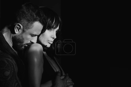 Photo for Sexy couple in love. Erotic love of hispanic man and sexy woman lovers - Royalty Free Image