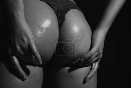 Foto de Sexy butt of sensual woman, buttocks in bikini, ass with thong lingerie closeup - Imagen libre de derechos