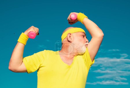 Photo for Muscular senior sport man. Healthcare cheerful lifestyle. Senior man in gym working out with weights. Like sports and muscles. Muscle strong power concept - Royalty Free Image