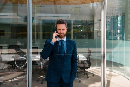 Photo for Business man using smartphone. Businessman talking on phone - Royalty Free Image