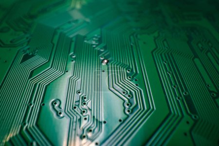 Photo for Circuit board. Technological electronic plate with roads and other components, selective focus. Technology background, electronics texture - Royalty Free Image
