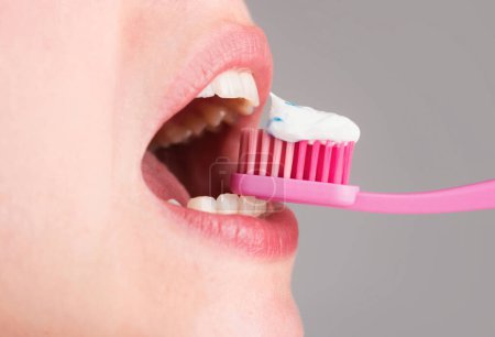 Photo for Dentist toothbrush of tooth brushing, dental health - Royalty Free Image