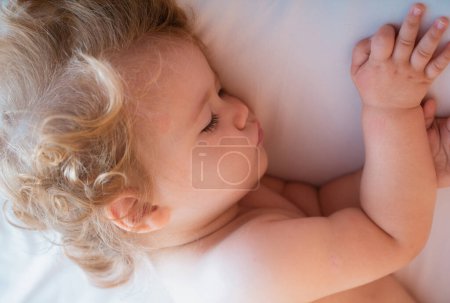 Photo for Baby sleeping in the bed. Kids sleepy face, child sleep. Close up face - Royalty Free Image