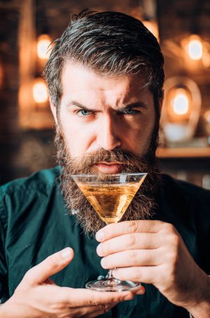 Photo for Barman with martini or liquor. Bearded man wearing suit and drinking alcohol. Drink and celebration party concept. Degustation and tasting - Royalty Free Image
