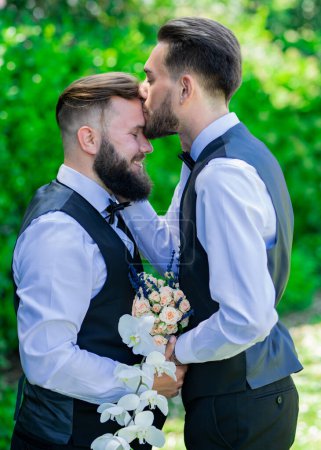 Photo for Gay man with partner on wedding day. Gay kiss on wedding. marriage gay couple tender kissing. close up portrait of gay kissed - Royalty Free Image