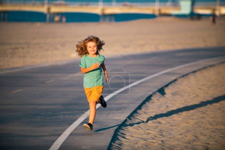 Photo for Cheerful child boy running to school. Kids run race - Royalty Free Image