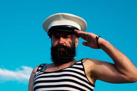 Photo for Funny captain sailor wearing hat. Seaman fun - Royalty Free Image