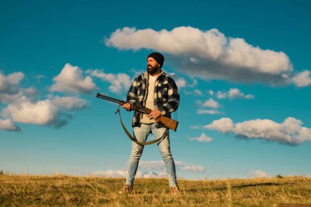 Photo for Hunting without borders. Hunter with shotgun gun on hunt. Closed and open hunting season - Royalty Free Image