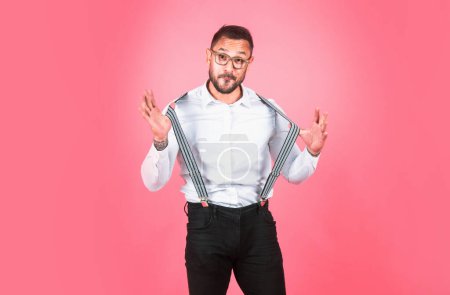 Photo for Freak guy. Portrait of funny funky crazy man with suspenders feel surprised face expression shout wear fun look outfit isolated over pink background - Royalty Free Image