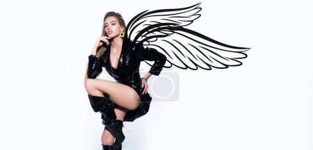 Photo for Sexy angel with wings. Valentines day wide photo banner for website header design. Latex leather fashion. Isolated on white. Sexy woman legs in high black boots - Royalty Free Image