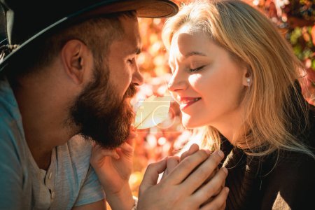Photo for Autumn couple in love. Happy family concept. Pretty woman and happy bearded man traveling together - Royalty Free Image
