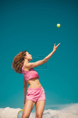 Photo for Girl playing tennis. Happy active female workout. Beautiful attractive fitness woman. Tennis concept. Sport and healthy lifestyle - Royalty Free Image