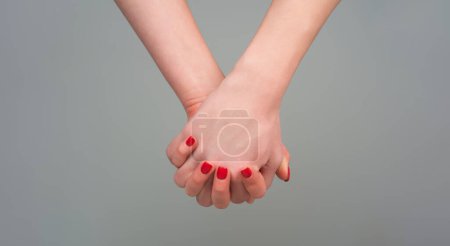 Photo for Helping hands. Holding hand, close up. Giving a helping hand. Support hand. Help hand gesture, sign of help and hope. Support arm, charity - Royalty Free Image