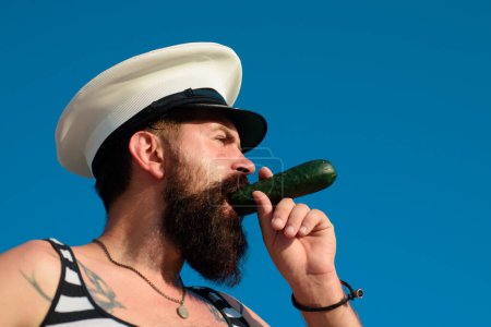 Photo for Funny captain sailor wearing hat. Seaman fun. Portrait of serious funny captain. Bearded sailor, seaman or pirate. Funny gay captain. Expression face or sailor on sky background. Seaman or Pirate - Royalty Free Image