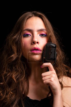 Photo for Woman with retro microphone. Closeup girl singer. Concert, sing - Royalty Free Image