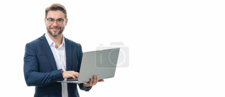 Photo for Man working on laptop in studio. Man checking email on laptop, writing message in social network, using internet, searching information on laptops. Banner for header, copy space. Poster for web design - Royalty Free Image
