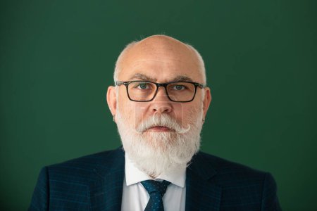 Photo for Closeup portrait of old male professor. Portrait of man with copy space. Successful face of mature teacher with eyeglasses - Royalty Free Image