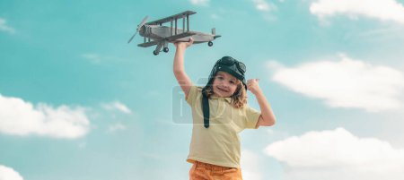 Photo for Freedom carefree and kids dream. Kid dreams of future. Kid pilot dreaming. Child dream concept. Blonde cute daydreamer child dream on fly. Dreams and imagination. Creative kid dreaming of fly - Royalty Free Image