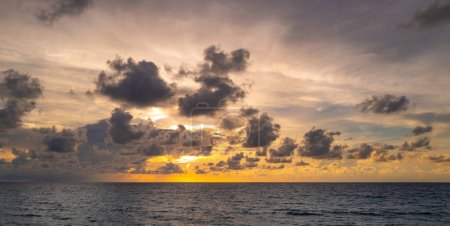Photo for Dark storm clouds background. Dramatic dark clouds sky. Dark cloudy tropical sky at sunset sea background. Stormy cloudy sky - Royalty Free Image