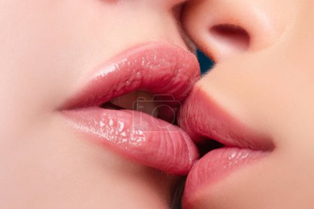 Photo for Lesbian couple kiss. Two lesbians kissing. Sensual lips. Passion and sexy sensual touch - Royalty Free Image