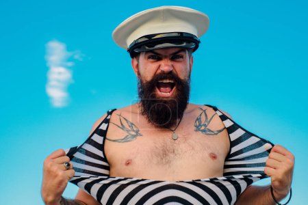 Photo for Funny excited captain. Expression face or sailor on sky background. Seaman or Pirate - Royalty Free Image