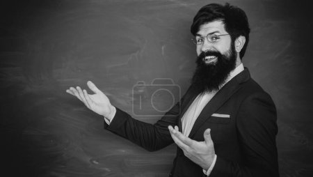 Photo for Thank You Teacher. Professor in class on blackboard background. Portrait of male University Student indoors. High school concept copy space. Teachers day. Chalkboard copy space - Royalty Free Image