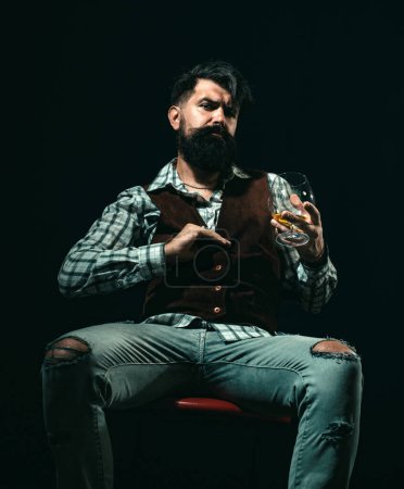 Photo for Alcohol concept. Sad man with depression looking in camera. Alcoholic in despair. Bartender with glass whiskey. Bring down stress - Royalty Free Image