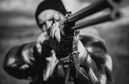 Photo for Hunter with shotgun gun on hunt. Closed and open hunting season. Hunting in America. Small game. Barrel of a gun - Royalty Free Image