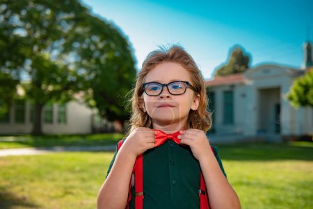 Photo for Back to school. Portrait of schoolboy from elementary school at the school yard - Royalty Free Image