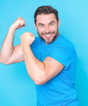 Photo for Emotional excited man with amazed expression. Human reaction and emotions. Close up studio portrait of excited man with facial expression. Emotional guy raising fists, celebrating success - Royalty Free Image
