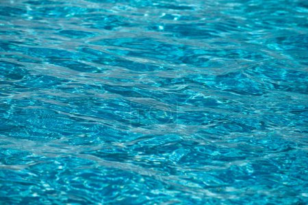 Pool water background, blue wave abstract or rippled water texture background