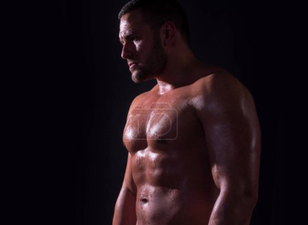 Photo for Guy with an athletic figure, with a naked torso. Chest muscles. Guy with an athletic figure, with a bare torso - Royalty Free Image