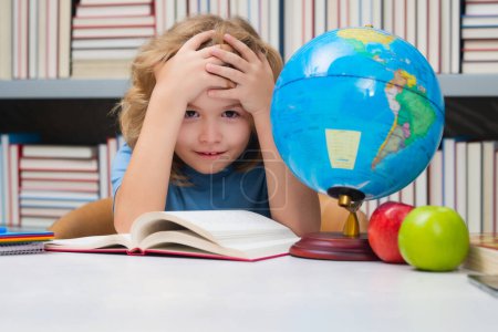 Photo for Tired and bored pupil. School kid student learning, study language or literature at school. Elementary school child. Portrait of nerd pupil studying - Royalty Free Image