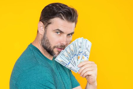 Photo for Business man with money banknotes. Male entrepreneur with dollar bills. Lucky boss, insurance agent, manager. Freelancer with cash. Mock up, for yellow banner with copy space - Royalty Free Image