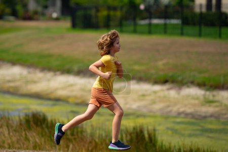 Photo for Active kids, sport children. Healthy sport activity for children. Little boy race. Young athlete in run training. Running sport for kid. Little runners jogging outdoors in summer park. Sport for kids - Royalty Free Image