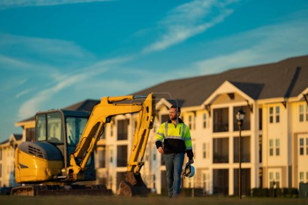 Photo for Worker with bulldozer on the building construction - Royalty Free Image