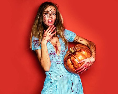 Butcher carcass. Animal hunger. Happy Halloween. Girl with pumpkin