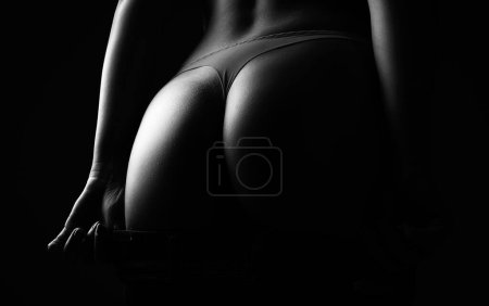 Photo for Intimacy concept. Cropped close up buttocks, lover in bikini with sexy butt. Nice ass. Sexy woman in underwear with perfect curves. Female ass in lingerie - Royalty Free Image