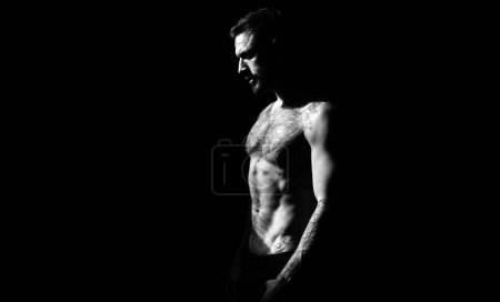 Photo for Brutal angry gang man lifestyle, serious handsome guy. Naked male shoulders, topless athletic body. Muscular athletic sexy male, naked torso - Royalty Free Image