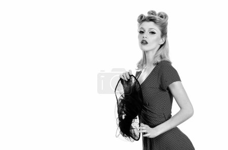 Photo for Caucasian blond model wearing hat posing in retro fashion and vintage concept studio shoot. White isolated - Royalty Free Image