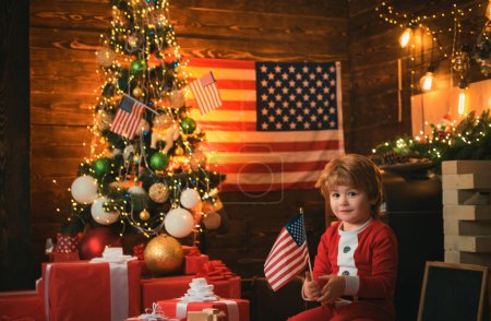 Photo for Merry Christmas in United States Of America. New Year in America. Santa helper with american flag. Christmas tree and american flag background - Royalty Free Image