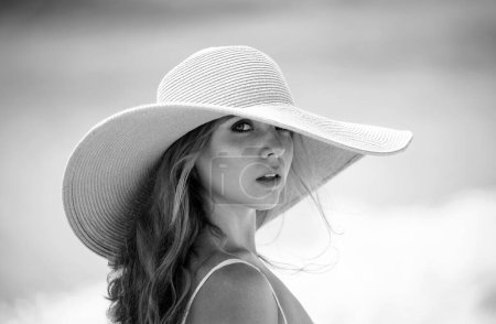 Photo for Portrait of female model posing on the beach. Summer fashionable woman, young beautiful woman face - Royalty Free Image