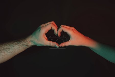 Photo for Female and male hands in form of heart. Hands in shape of love heart. Heart from hands. Man and woman hand in hearts form love. Sign heart by fingers. Love on Valentine day. Love sign. Charity - Royalty Free Image