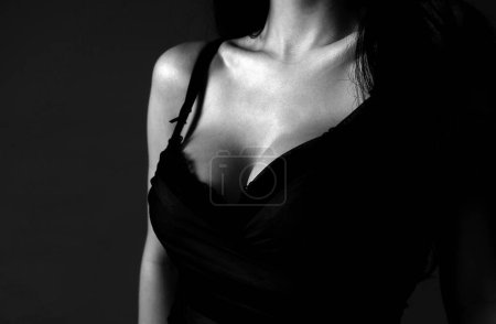 Photo for Sexy large breasts. Woman breas, boobs in bra, sensual tits. Beautiful naked body. Lingerie model. Closeup of sexy female boob in black bra - Royalty Free Image