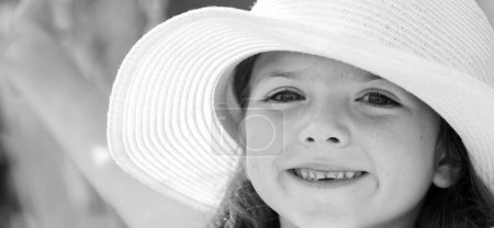 Photo for Happy child face closeup. Child teen girl has summer joy. Happy day. Cute playful cheerful kid with funny face. Happy child relax in summer green background - Royalty Free Image