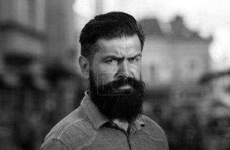 Photo for Young handsome bearded hipster man in the city - Royalty Free Image