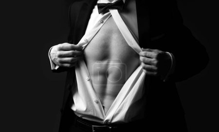 Photo for Man shows abs. Six packs closeup. Sexy male torso in suit. Classic fashion look. Man undress suit - Royalty Free Image